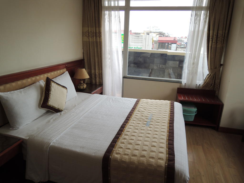 Satel Hotel Hanói Quarto foto