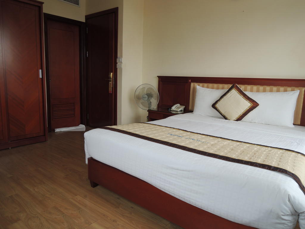 Satel Hotel Hanói Quarto foto