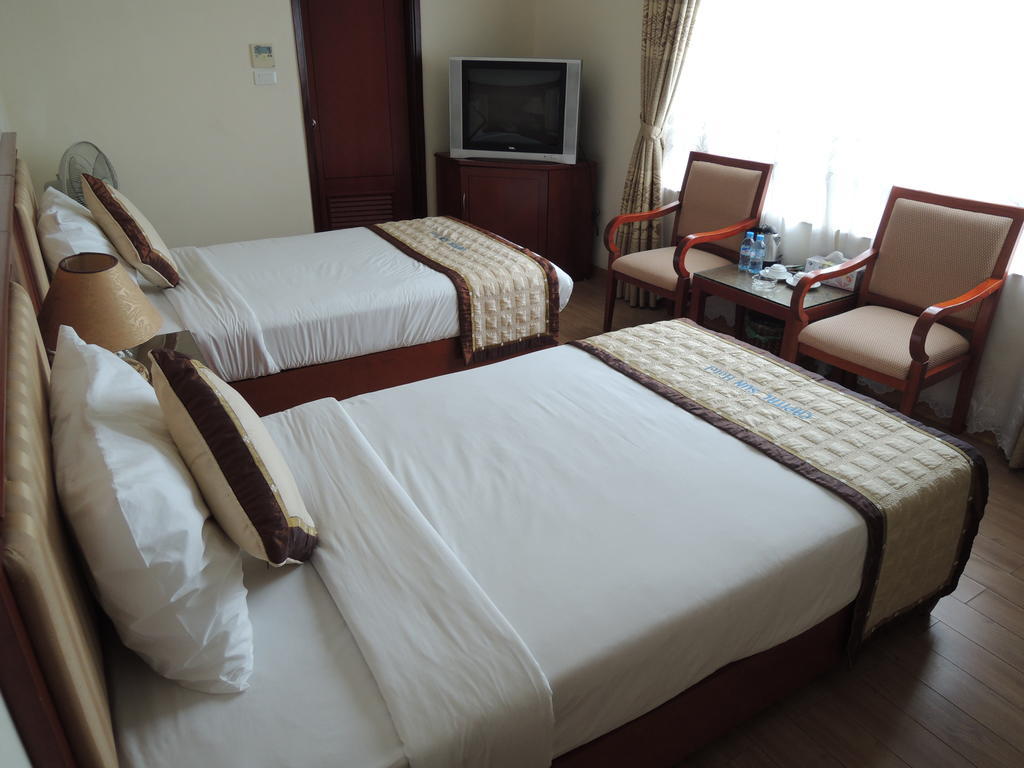Satel Hotel Hanói Quarto foto