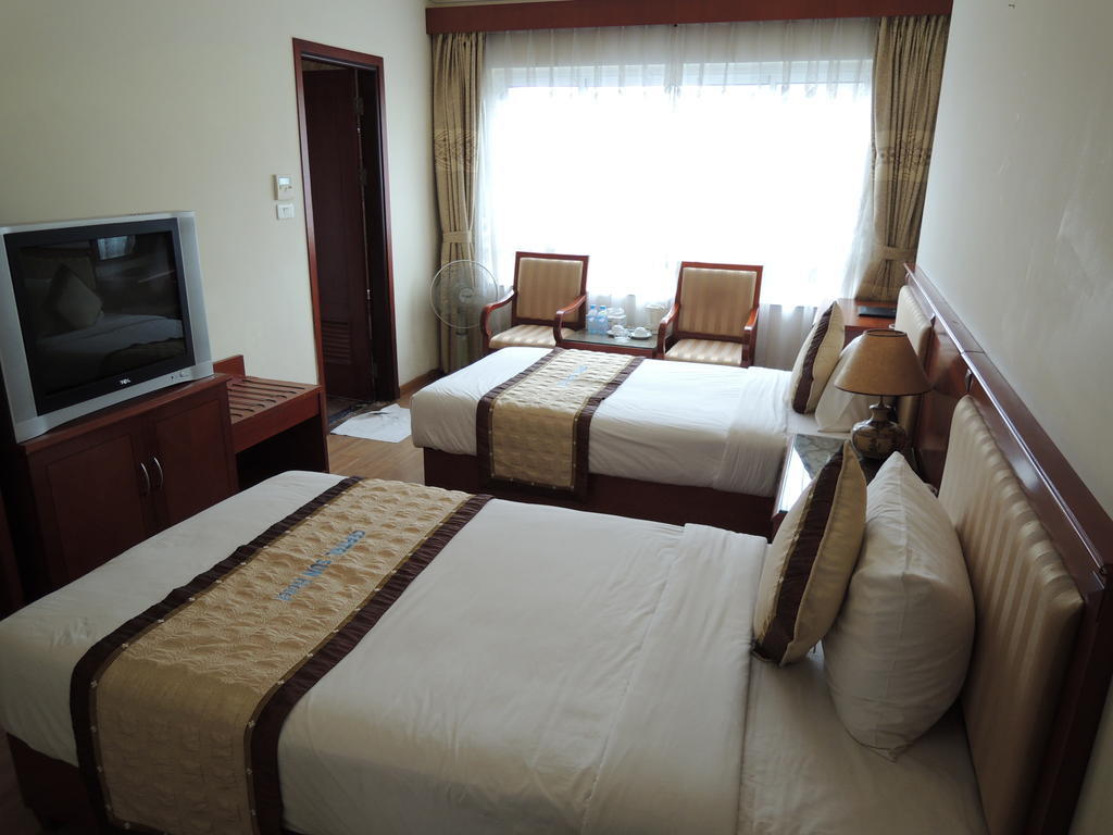 Satel Hotel Hanói Quarto foto